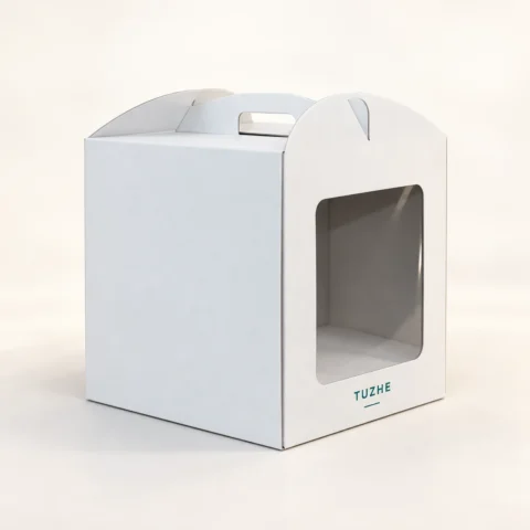 Front-Opening Window Cake Carrier — Custom Design Concept AI design concept: closed white TUZHE cake carrier with a front film window, opaque paper walls and integrated carry top