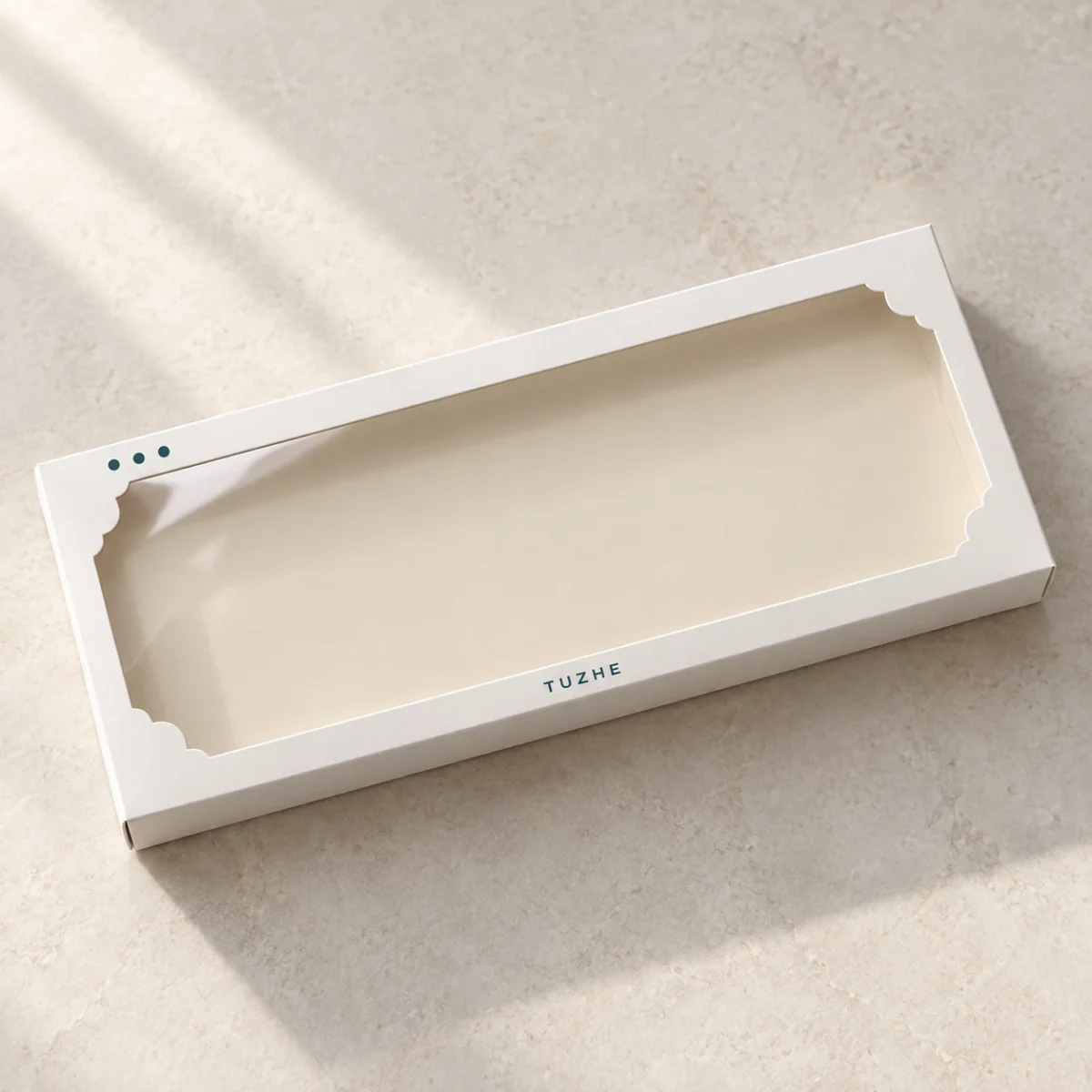 Decorated Cookie Sets: Make a Height Map Before Choosing Box Depth AI design concept: shallow white TUZHE cookie carton with one continuous scalloped-corner window, shown closed and empty