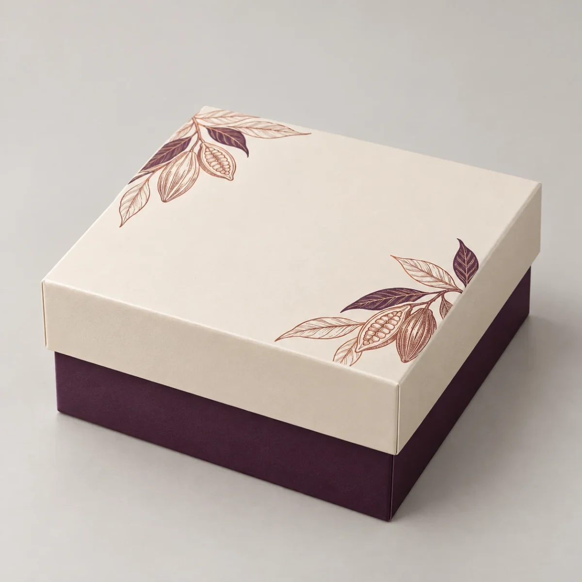 Custom Square Chocolate Gift Box with Removable Lid — Design Concept Closed square chocolate gift box concept with an ivory removable lid, cacao-pod line artwork and a deep aubergine base