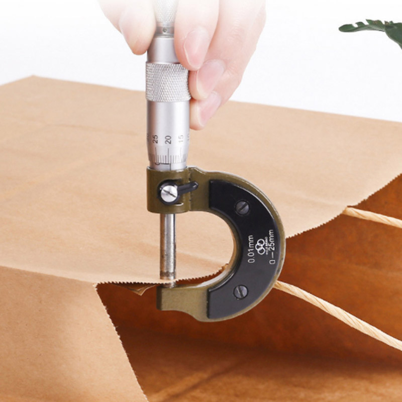 Structure and component detail for brown kraft carrier bags with paper handles