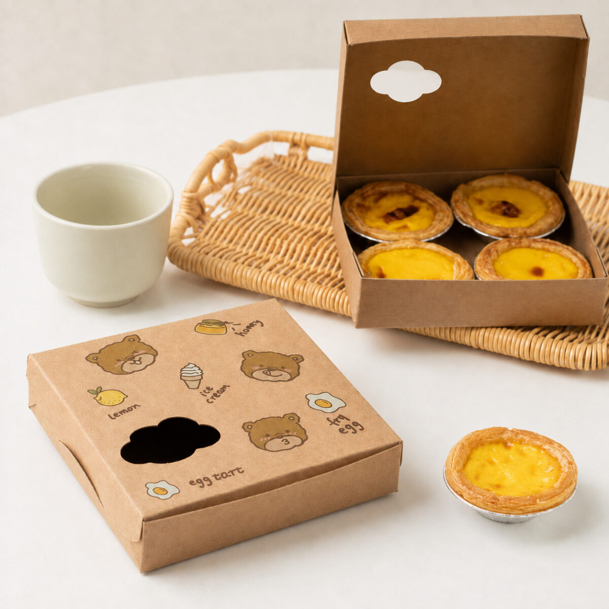Size Egg Tart Boxes Around the Actual Portion Layout Kraft egg tart box with bear illustrations and a shaped window beside an open four-tart box