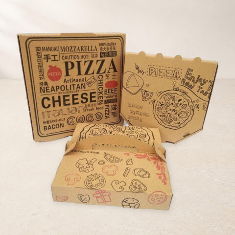 Three kraft pizza boxes with original printed designs and folding details